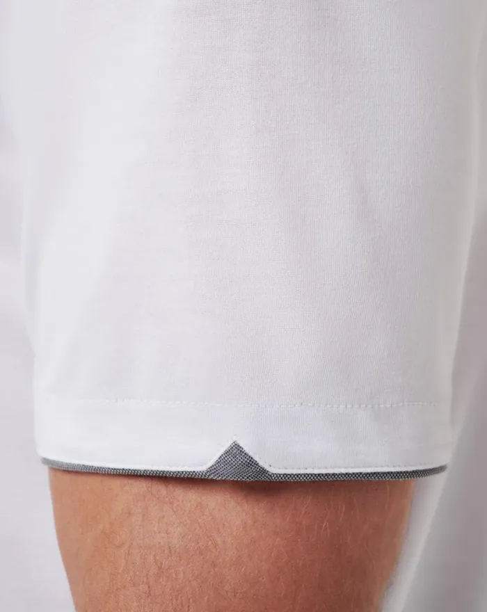 Men RESERVATION NUMBER POLO White TravisMathew Polos