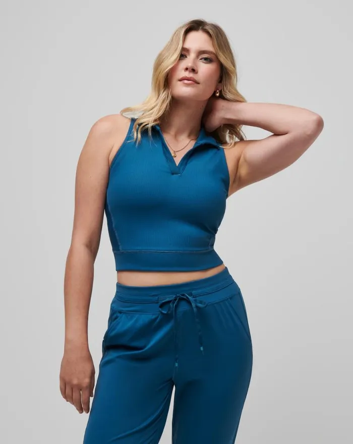 Women MOVEKNIT SLEEVELESS VNECK POLO Midnight TravisMathew Polos