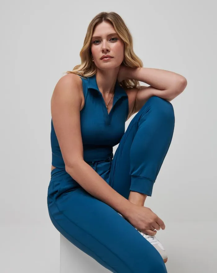 Women MOVEKNIT SLEEVELESS VNECK POLO Midnight TravisMathew Polos