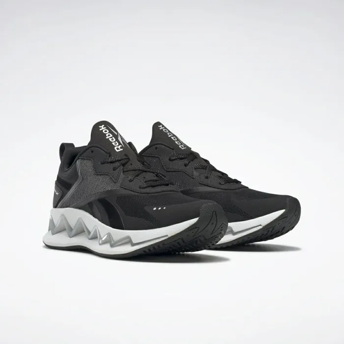 Zig Womens Reebok Zig Elusion Energy Shoes White Black Silver Met